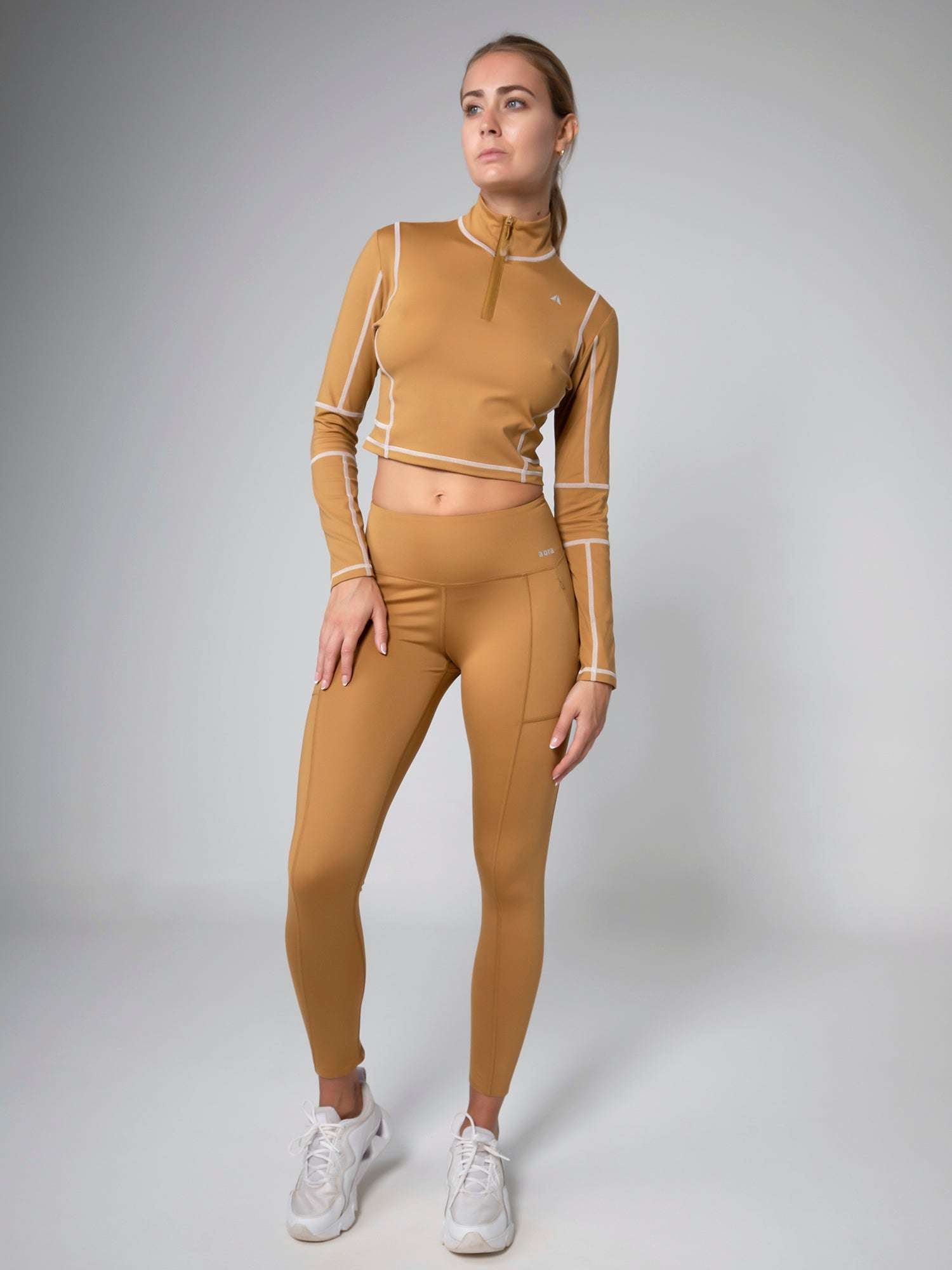 KANZEI ZIP LONGSLEEVE For Women - Aora Athliesure Shop online in Abu Dhabi