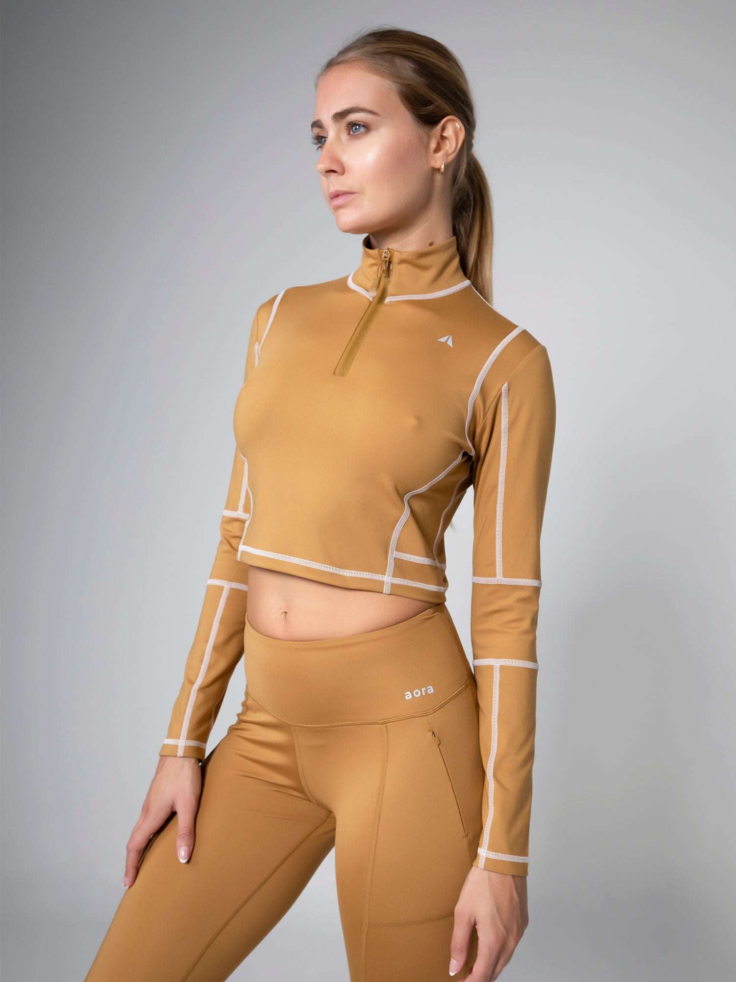 KANZEI ZIP LONGSLEEVE For Women - Aora Athliesure Shop online in Abu Dhabi